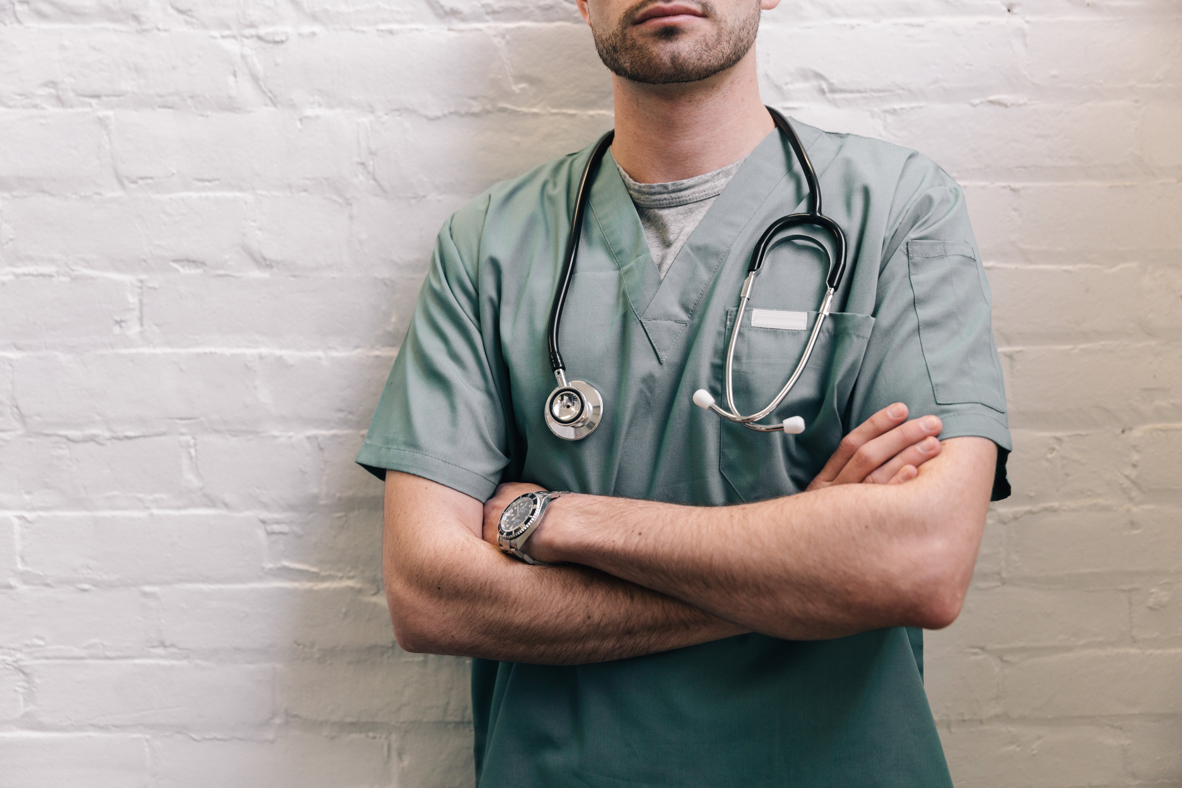 male-doctor-standing-with-arms-crossed.jpg